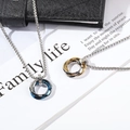 Three-color interlocking ring pendant necklace on leather texture for a modern look - With Chain / Gold