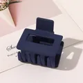 Detail of a large matte navy blue rectangular hair claw clip with a strong spring - Small Rectangular - Matte Navy Blue