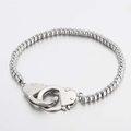 Polished silver stainless steel bead bracelet featuring unique handcuff charm pendants - Steel Color (KB133678-Z)