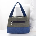 Portable lunch bag in gray-green and navy blue two-tone design with exterior zipper pocket - Green