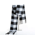 Classic black and white checkered scarf with fringe hanging on a metal display stand - Black and White Five-Grid