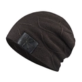 Detailed view of dark brown knit beanie featuring a leather patch with a star logo emblem - Coffee