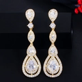 Boucles d'oreilles pendantes dorées avec zircons AAA pour soirées et occasions habillées - Doré