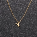 Minimalist stainless steel O-chain necklace with a gold letter Y pendant on dark background - Gold Y