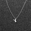 Minimalist stainless steel silver letter Y pendant necklace on a black sparkling background - Steel Y