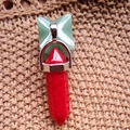 Natural red hexagonal crystal pillar pendant necklace with silver clasp on fabric - Red Jade
