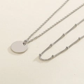 Elegant silver necklace featuring a minimalist round disc pendant and beaded chain detail - Steel Color (KN113854-Z)