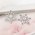 Paire de pendentifs flocon de neige en alliage argenté évidé pour bijoux DIY - 24mm Flocon de Neige-10079