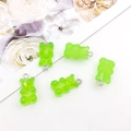 Five translucent green gummy bear resin pendants with metal loops on a white surface - Bear - Solid Green (12571)