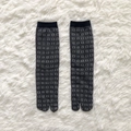 Dark grey Tabi split-toe socks with white square patterns and black cuffs on plush surface - 35-41 / Heather Gray Squares