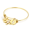 Adjustable gold titanium steel bracelet featuring a pearl and letter F charm with kids silhouettes - Letter F / Gold