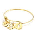 Gold-plated stainless steel bangle featuring shell letter W, pearl, and child charms - Letter W / Gold