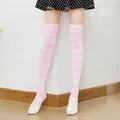 Pink and white striped over-the-knee cotton socks styled with canvas shoes - One Size / Pink White Wide Stripe