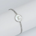 Bracelet argenté en acier inoxydable avec maille Figaro et pendentif lettre K - Lettre K / Acier
