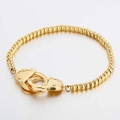 Golden beaded bracelet featuring interlocking handcuff charms in a polished finish - Gold (KB133677-Z)