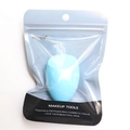 Blue beauty blender makeup sponge in professional packaging for flawless application - Blue Slanted In Bag