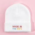 Close-up of MADE IN THE 90'S colorful embroidery on white knit beanie on pink background - M (56-58cm) / White