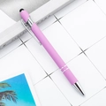 Sleek pink stylus pen with silver metallic accents on a minimalist desktop background - Pale Purple