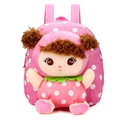 Close-up of kids pink polka dot canvas backpack with a 3D plush doll decoration - Mousse Pink