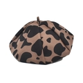 Close-up of brown and black cow print beret hat made of premium wool felt material - M (56-58cm) / Brown