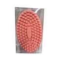 Pink silicone baby bath brush with soft massage bristles in transparent packaging - Baby Pink