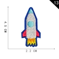 Embroidered rocket ship iron-on patch measuring 4.5 x 2.2 cm for DIY clothing - Blue Rocket