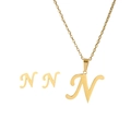 Detailed view of gold stainless steel jewelry set featuring letter N necklace and earrings - N Set