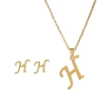 Macro view of gold stainless steel necklace and earrings set featuring letter H pendants - H Set