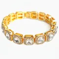Pulsera de hip hop para hombre en acabado dorado con grandes circonitas de corte cuadrado - 20cm / Dorado