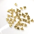 Macro detail of 14K gold filled butterfly spacer beads for DIY jewelry making crafts - Butterfly 5.5mm / 14K Gold Plated