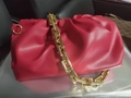 Red cloud clutch bag with chunky gold metal chain strap and pleated leather design - Red