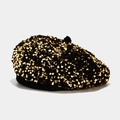 Detail of a black beret hat with shimmering gold sequins on a light grey background - Pumpkin Hat / Gold
