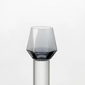 Minimalist geometric faceted glass cup in dark grey finish on a clear display stand - Grey Short Hexagon Glass Cup