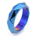 Macro view of mechanical geometric faceted stainless steel ring in blue and purple finish - US 7 / Blue