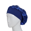 Blue satin sleep bonnet with wide elastic headband for hair protection on model - One Size / Sapphire Blue