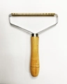 Close-up of portable lint remover with wooden handle and pure copper double-sided blade - OPP Bag / Galvanized/Copper Plated + Iron Frame