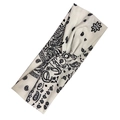 Women's paisley print twisted headband in white and black for sports and yoga - White