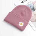 Pink knitted beanie with white daisy embroidery and warm texture for women and men - Pink