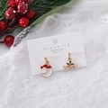 Close-up of asymmetrical Christmas earrings with NOEL letters and Santa Claus on white card - 12# Moon Santa & NOEL