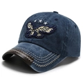 Retro washed navy denim baseball cap featuring eagle embroidery and brown leather brim - Blue