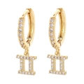 Gold Aries zodiac hoop earrings with shimmering cubic zirconia stones on white background - Gold / Gemini