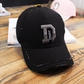 Fashionable black baseball cap featuring handcrafted black rhinestones and a silver D logo - D Label Black