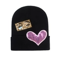 Women's knit beanie in black featuring sparkling gold eye and pink heart sequin patches - Pink Sequin Heart