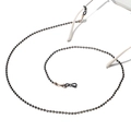 Detail of beaded eyewear chain with black and gold metal beads on a clean white background - Black