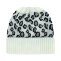 Detailed close-up of white leopard print knitted beanie showing rib-knit cuff and texture - White