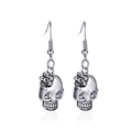 Vintage silver skull earrings with floral details and gothic style on white background - Small Skull Style