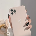 Close-up of a matte pink iPhone case featuring white heart line art held by hand - Series 12 6.1 / Antique White Heart