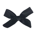 Detailed view of the soft texture and glossy finish of a black velvet ribbon bow accessory - No.22 Black