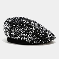 Detailed view of shimmering black and silver sequins on a stylish women's beret hat - Beret / Silver