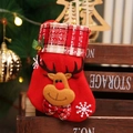 Close-up of red Christmas stocking with 3D reindeer doll, sequins and plaid cuff detail - Plaid Reindeer
